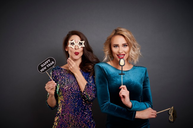 Two Women Posing In Photo Booth